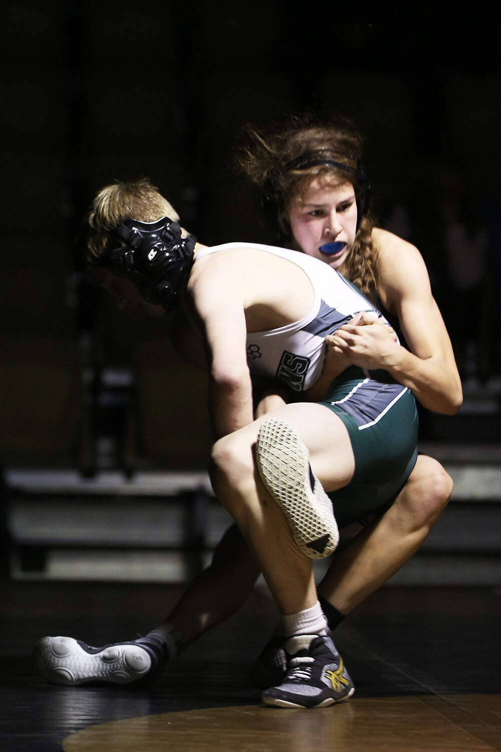 Teila Peters attempts to pull down opponent Ethan Keffer